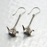 Silver origami peace crane earrings by Azulie, suspended from mid-length sterling silver chain