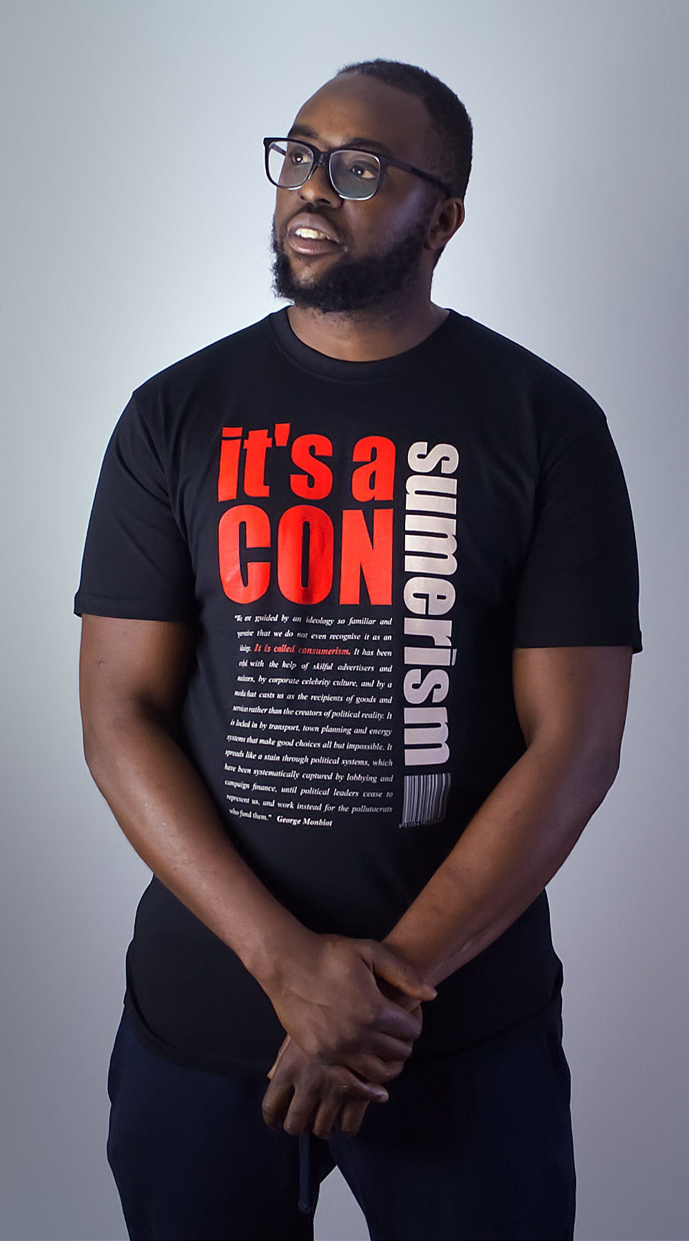 Men's black Art-Shirt 'Consumerism' by Gary McFeat featuring George Monbiot quote, GOTS certified organic cotton